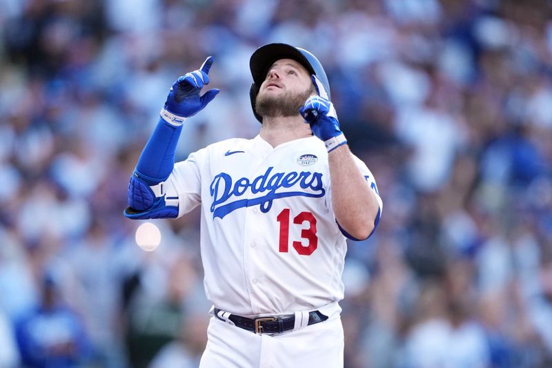 Jun 2, 2023; Los Angeles, California, USA; Los Angeles Dodgers third baseman Max Muncy (13) celebrates after hitting a two-run home run in the first inning against the New York Yankees at Dodger Stadium. Mandatory Credit: Kirby Lee-USA TODAY Sports