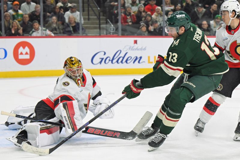 Dec 13, 2025; Saint Paul, Minnesota, USA;  Ottawa Senators goalie Leevi Merilainen (1) stops Minnesota Wild forward Yakov Trenin (13) on a breakaway during the second period at Grand Casino Arena. Mandatory Credit: Nick Wosika-Imagn Images