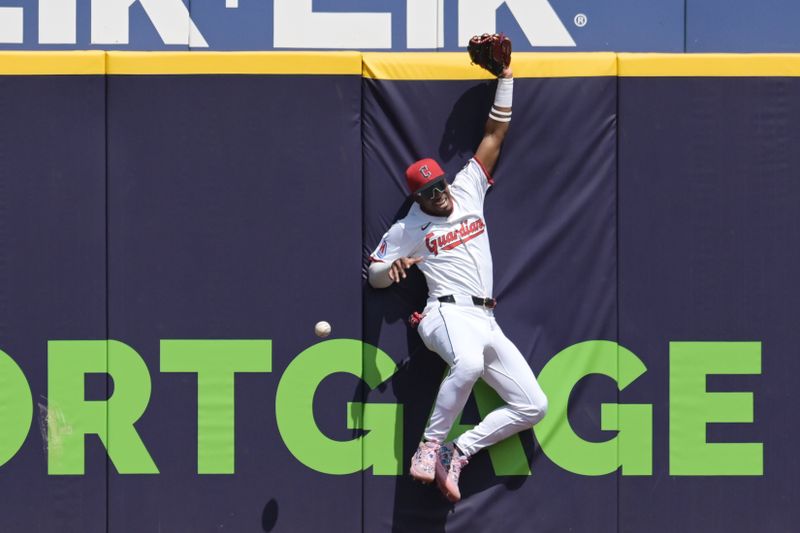 Apr 23, 2025; Cleveland, Ohio, USA; Cleveland Guardians center fielder Angel Martinez (1) can not catch an RBI double hit by New York Yankees designated hitter Paul Goldschmidt (not pictured) during the first inning at Progressive Field. Mandatory Credit: Ken Blaze-Imagn Images