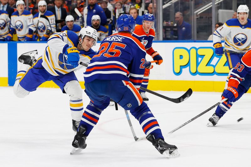 Jan 25, 2025; Edmonton, Alberta, CAN; Buffalo Sabres forward Peyton Krebs (19) gets a shot away in front of Edmonton Oilers defensemen Darnell Nurse (25) during the second period at Rogers Place. Mandatory Credit: Perry Nelson-Imagn Images