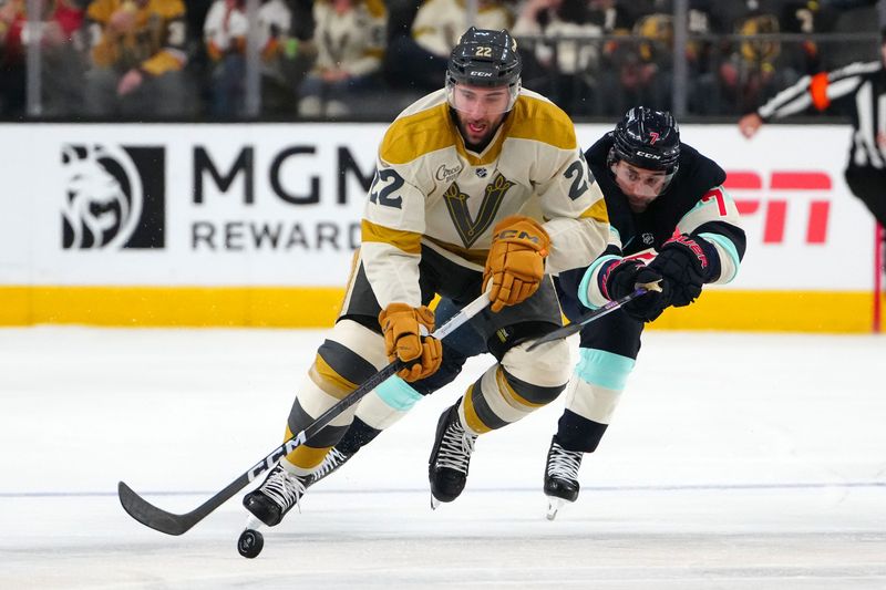 Mar 21, 2024; Las Vegas, Nevada, USA; Vegas Golden Knights right wing Michael Amadio (22) skates ahead of Seattle Kraken right wing Jordan Eberle (7) during the second period at T-Mobile Arena. Mandatory Credit: Stephen R. Sylvanie-USA TODAY Sports