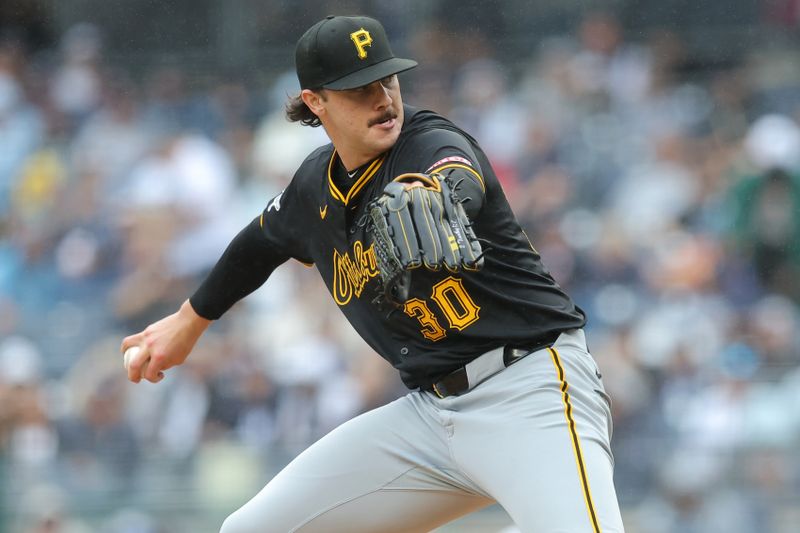 Sep 28, 2024; Bronx, New York, USA; Pittsburgh Pirates starting pitcher Paul Skenes (30) pitches against the New York Yankees during the first inning at Yankee Stadium. Mandatory Credit: Brad Penner-Imagn Images