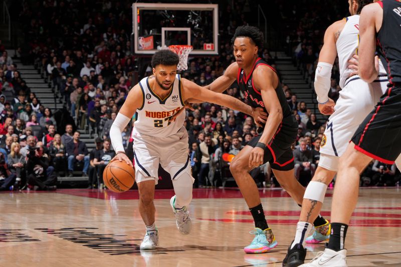 TORONTO, CANADA - MARCH 14: Jamal Murray #27 of the Denver Nuggets drives to the basket against the Toronto Raptors on march 14, 2023 at the Scotiabank Arena in Toronto, Ontario, Canada. NOTE TO USER: User expressly acknowledges and agrees that, by downloading and or using this Photograph, user is consenting to the terms and conditions of the Getty Images License Agreement.  Mandatory Copyright Notice: Copyright 2023 NBAE (Photo by Mark Blinch/NBAE via Getty Images)