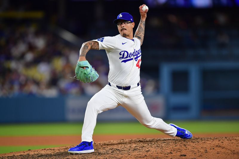 Jul 18, 2025; Los Angeles, California, USA; Los Angeles Dodgers pitcher Anthony Banda (43) throws against the Milwaukee Brewers during the ninth inning at Dodger Stadium. Mandatory Credit: Gary A. Vasquez-Imagn Images