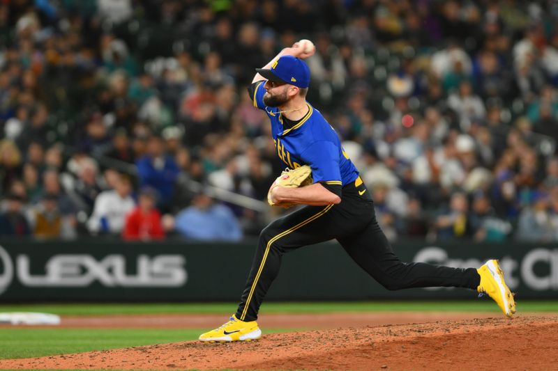 Apr 26, 2024; Seattle, Washington, USA; Seattle Mariners relief pitcher Cody Bolton (67) pitches to the Arizona Diamondbacks during the eighth inning at T-Mobile Park. Mandatory Credit: Steven Bisig-USA TODAY Sports