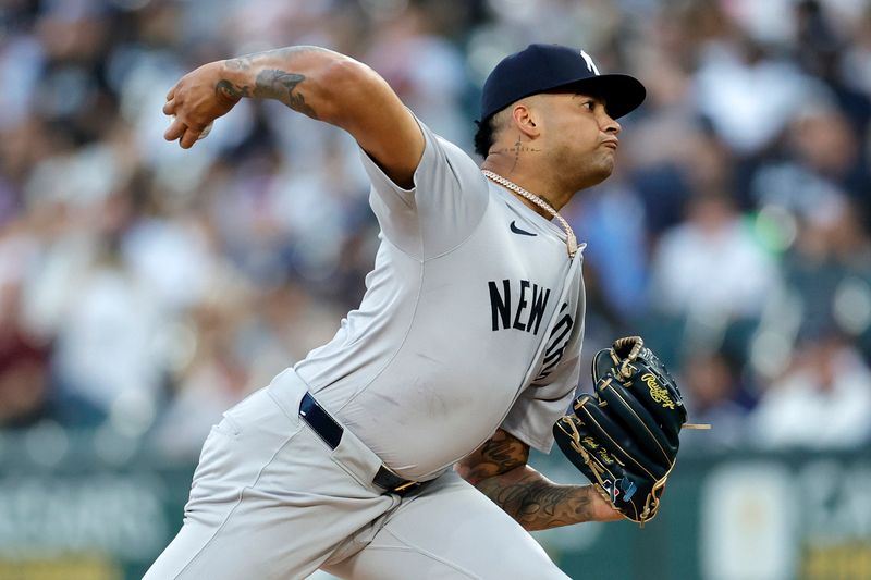 Aug 12, 2024; Chicago, Illinois, USA; New York Yankees pitcher Luis Gil (81) throws pitch against the Chicago White Sox during the first inning at Guaranteed Rate Field. Mandatory Credit: Kamil Krzaczynski-USA TODAY Sports