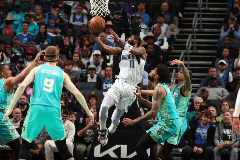 CHARLOTTE, NC - APRIL 9: Kyrie Irving #11 of the Dallas Mavericks shoots the ball during the game against the Charlotte Hornets on April 9, 2024 at Spectrum Center in Charlotte, North Carolina. NOTE TO USER: User expressly acknowledges and agrees that, by downloading and or using this photograph, User is consenting to the terms and conditions of the Getty Images License Agreement. Mandatory Copyright Notice: Copyright 2024 NBAE (Photo by Kent Smith/NBAE via Getty Images)