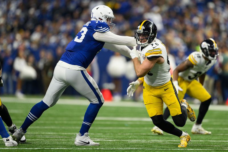 Pittsburgh Steelers linebacker T.J. Watt (90) rushes around the edge against Indianapolis Colts tackle Blake Freeland (73) during an NFL football game, Saturday, Dec. 16, 2023, in Indianapolis. (AP Photo/Zach Bolinger)