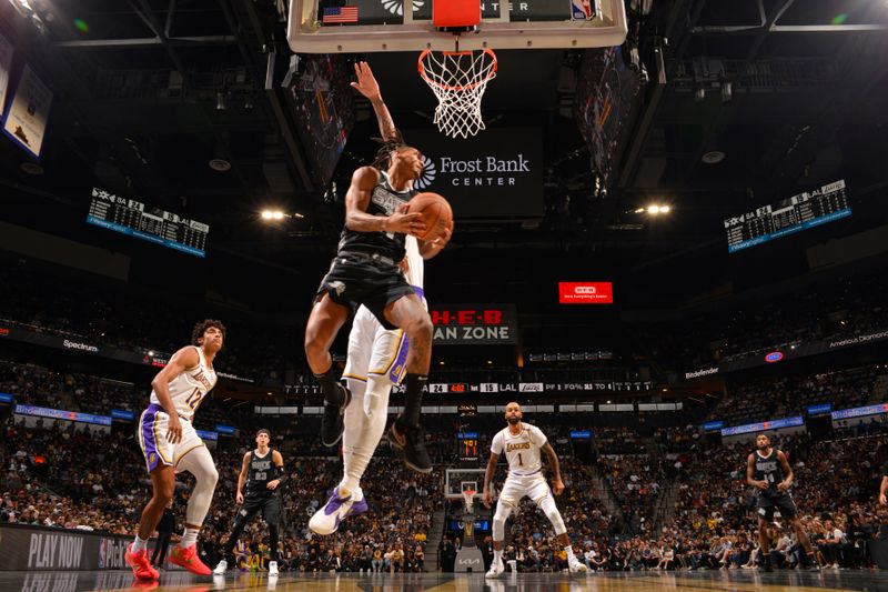 SAN ANTONIO, TX - NOVEMBER 15: Stephon Castle #5 of the San Antonio Spurs drives to the basket during the game against the Los Angeles Lakers during the Emirates NBA Cup game on November 15, 2024 at the Frost Bank Center in San Antonio, Texas. NOTE TO USER: User expressly acknowledges and agrees that, by downloading and or using this photograph, user is consenting to the terms and conditions of the Getty Images License Agreement. Mandatory Copyright Notice: Copyright 2024 NBAE (Photos by Jesse D. Garrabrant/NBAE via Getty Images)