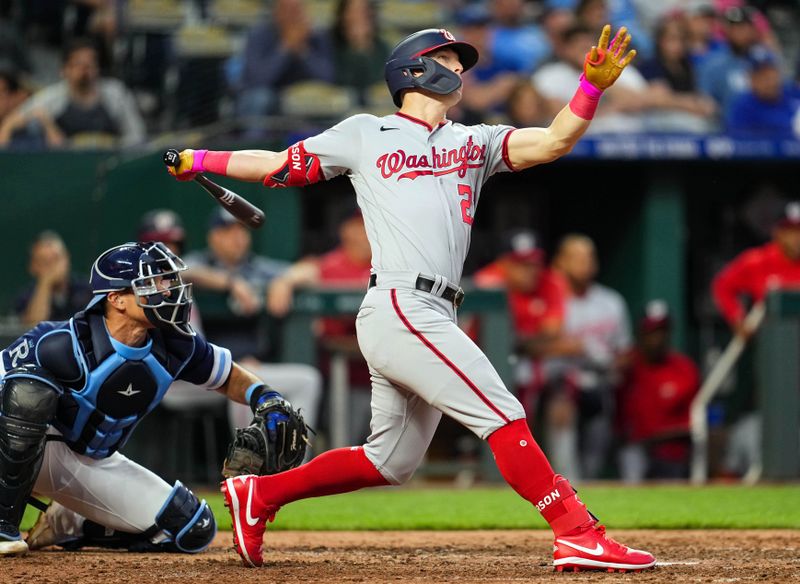 May 26, 2023; Kansas City, Missouri, USA; Washington Nationals left fielder Corey Dickerson (23) hits a home run against the Kansas City Royals during the sixth inning  at Kauffman Stadium. Mandatory Credit: Jay Biggerstaff-USA TODAY Sports