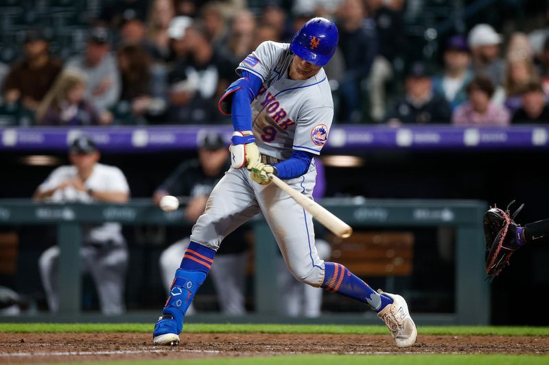 May 26, 2023; Denver, Colorado, USA; New York Mets center fielder Brandon Nimmo (9) hits a triple in the ninth inning against the Colorado Rockies at Coors Field. Mandatory Credit: Isaiah J. Downing-USA TODAY Sports