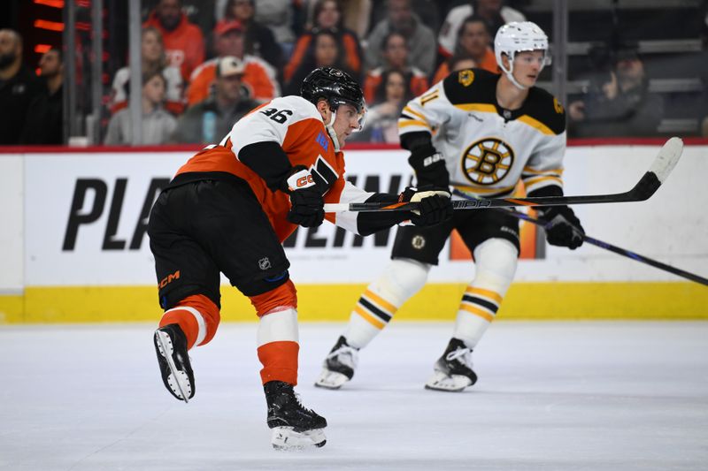 Nov 2, 2024; Philadelphia, Pennsylvania, USA; Philadelphia Flyers defenseman Emil Andrae (36) shoots the puck against the Boston Bruins in the second period at Wells Fargo Center. Mandatory Credit: Kyle Ross-Imagn Images