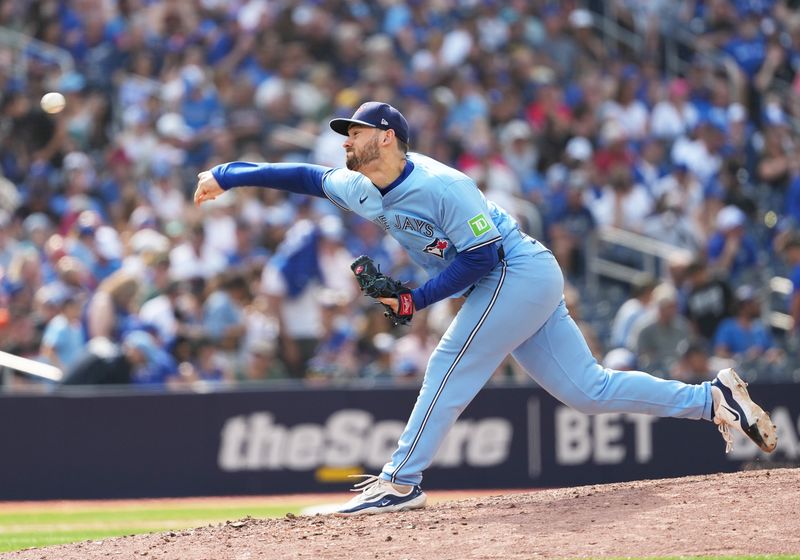 Aug 25, 2024; Toronto, Ontario, CAN; Toronto Blue Jays relief pitcher Zach Pop (56) throws a pitch against the Los Angeles Angels during the ninth inning at Rogers Centre. Mandatory Credit: Nick Turchiaro-USA TODAY Sports