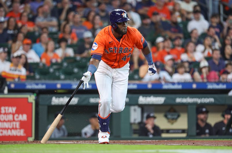 May 31, 2024; Houston, Texas, USA; Houston Astros designated hitter Yordan Alvarez (44) hits a single during the first inning against the Minnesota Twins at Minute Maid Park. Mandatory Credit: Troy Taormina-USA TODAY Sports