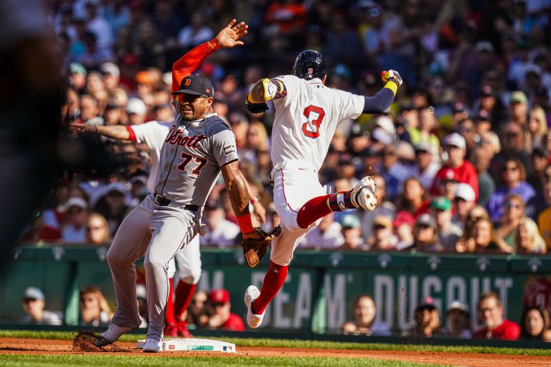 Sep 28, 2025; Boston, Massachusetts, USA; Boston Red Sox outfielder Ceddanne Rafaela (3) reaches first base against Detroit Tigers first base Andy Ibáñez (77) on a bunt in the first inning at Fenway Park. Mandatory Credit: David Butler II-Imagn Images