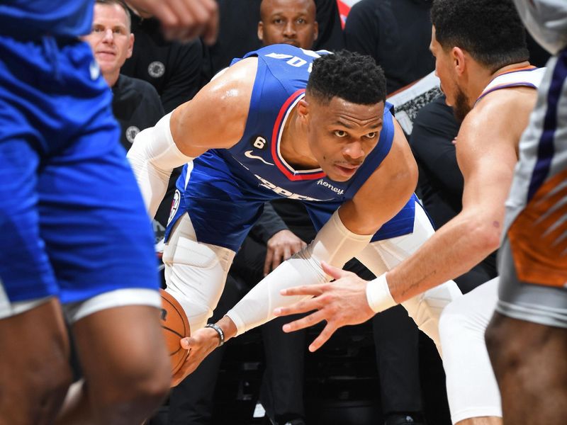 LOS ANGELES, CA - APRIL 20:  Russell Westbrook  #0 of the LA Clippers handles the ball against the Phoenix Suns during Round 1 Game 3 of the 2023 NBA Playoffs on April 20, 2023 at Crypto.Com Arena in Los Angeles, California. NOTE TO USER: User expressly acknowledges and agrees that, by downloading and/or using this Photograph, user is consenting to the terms and conditions of the Getty Images License Agreement. Mandatory Copyright Notice: Copyright 2023 NBAE (Photo by Andrew D. Bernstein/NBAE via Getty Images)