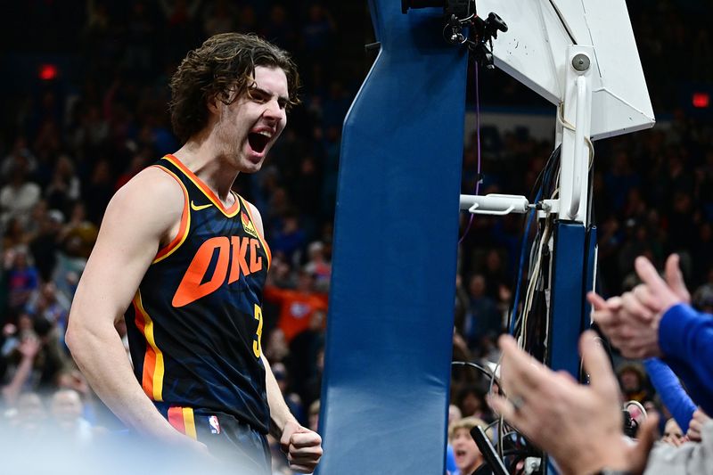 OKLAHOMA CITY, OKLAHOMA - FEBRUARY 4: Josh Giddey #3 of the Oklahoma City Thunder celebrates after a shot during the second overtime against the Toronto Raptors at Paycom Center on February 4, 2024 in Oklahoma City, Oklahoma. NOTE TO USER: User expressly acknowledges and agrees that, by downloading and or using this Photograph, user is consenting to the terms and conditions of the Getty Images License Agreement. (Photo by Joshua Gateley/Getty Images)