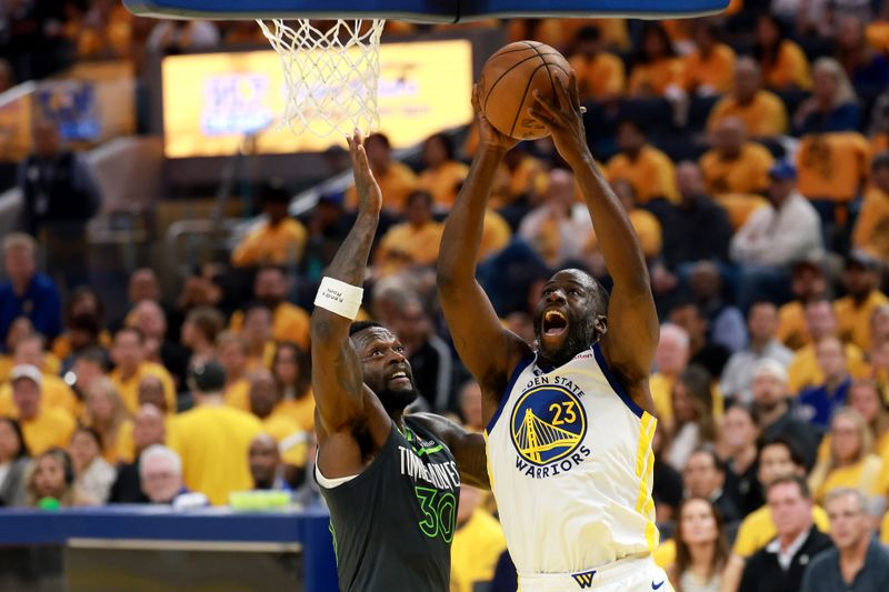 SAN FRANCISCO, CALIFORNIA - MAY 10: Draymond Green #23 of the Golden State Warriors shoots the ball against Julius Randle #30 of the Minnesota Timberwolves during the second quarter in Game Three of the Western Conference Second Round NBA Playoffs at Chase Center on May 10, 2025 in San Francisco, California. NOTE TO USER: User expressly acknowledges and agrees that, by downloading and or using this photograph, User is consenting to the terms and conditions of the Getty Images License Agreement. (Photo by Ezra Shaw/Getty Images)