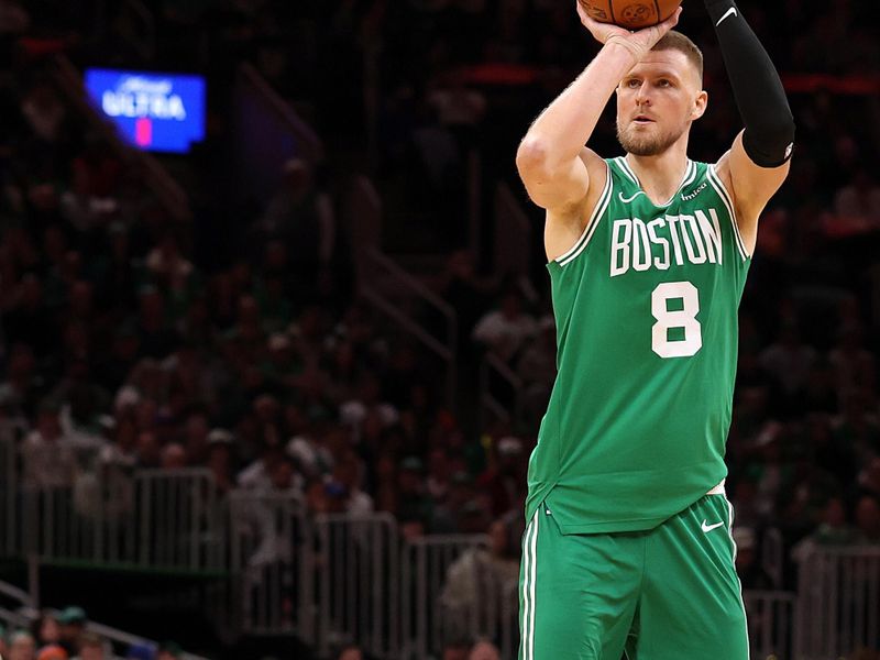 BOSTON, MASSACHUSETTS - FEBRUARY 23: Kristaps Porzingis #8 of the Boston Celtics takes a shot against the New York Knicks during the second half at TD Garden on February 23, 2025 in Boston, Massachusetts.  The Celtics defeat the Knicks 118-105. NOTE TO USER: User expressly acknowledges and agrees that, by downloading and or using this photograph, User is consenting to the terms and conditions of the Getty Images License Agreement.  (Photo by Maddie Meyer/Getty Images)