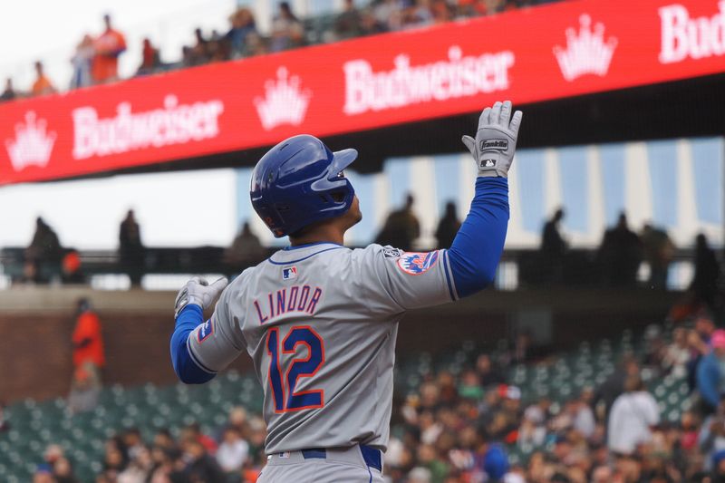 Apr 24, 2024; San Francisco, California, USA; New York Mets shortstop Francisco Lindor (12) celebrates as he crosses the plate after hitting a two-run home run against the San Francisco Giants during the third inning at Oracle Park. Mandatory Credit: Kelley L Cox-USA TODAY Sports