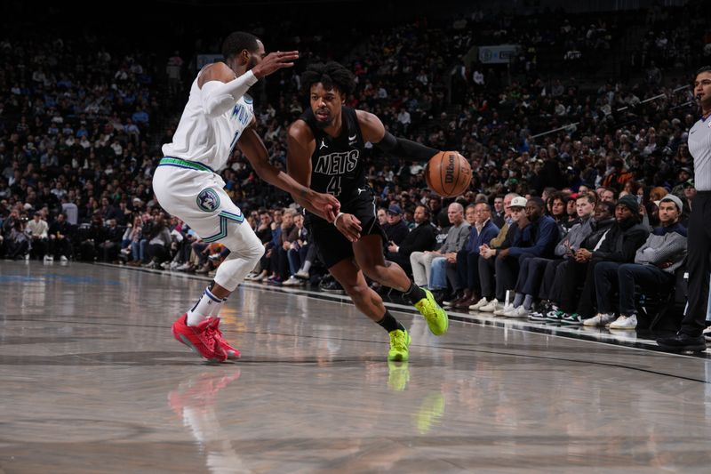 BROOKLYN, NY - JANUARY 25: Dennis Smith Jr. #4 of the Brooklyn Nets drives to the basket during the game against the Minnesota Timberwolves on January 25, 2024 at Barclays Center in Brooklyn, New York. NOTE TO USER: User expressly acknowledges and agrees that, by downloading and or using this Photograph, user is consenting to the terms and conditions of the Getty Images License Agreement. Mandatory Copyright Notice: Copyright 2024 NBAE (Photo by Jesse D. Garrabrant/NBAE via Getty Images)