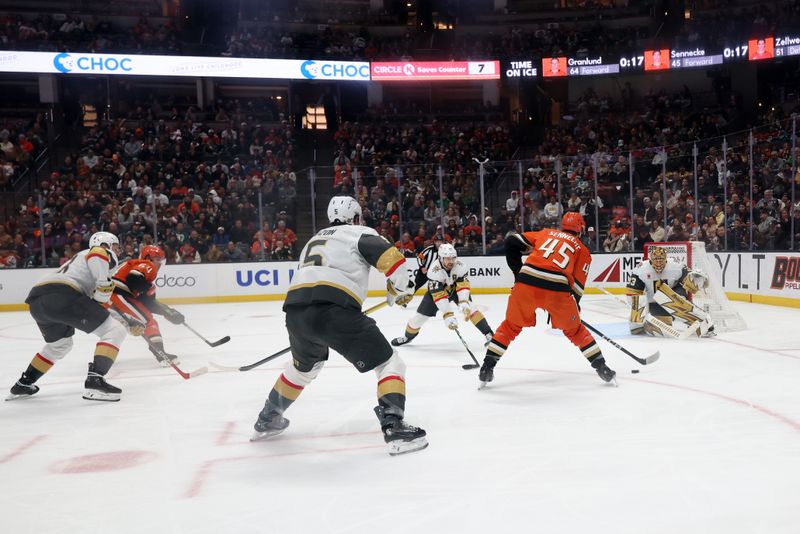 Feb 1, 2026; Anaheim, California, USA;  Anaheim Ducks right wing Beckett Sennecke (45) attacks the goal against Vegas Golden Knights goaltender Adin Hill (33) during the second period at Honda Center. Mandatory Credit: Kiyoshi Mio-Imagn Images