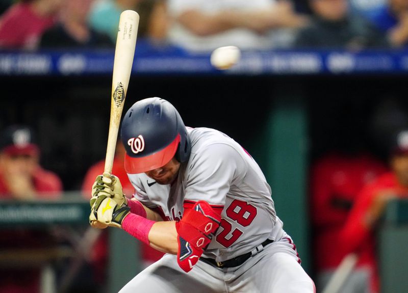 May 26, 2023; Kansas City, Missouri, USA; Washington Nationals right fielder Lane Thomas (28) ducks a pitch during the sixth inning against the Kansas City Royals at Kauffman Stadium. Mandatory Credit: Jay Biggerstaff-USA TODAY Sports