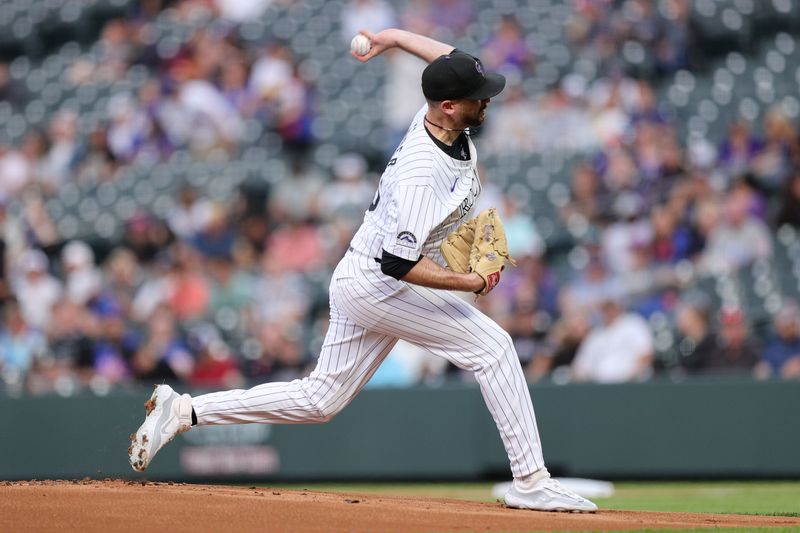 Sep 13, 2024; Denver, Colorado, USA; Colorado Rockies starting pitcher Austin Gomber (26) pitches in the first inning against the Chicago Cubs at Coors Field. Mandatory Credit: Isaiah J. Downing-Imagn Images