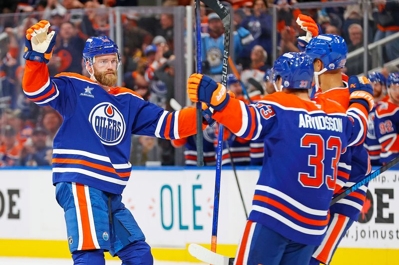 Oct 25, 2024; Edmonton, Alberta, CAN; The Edmonton Oilers celebrate a goal scored by defensemen Mattias Ekholm (14) during the third period against the Pittsburgh Penguins at Rogers Place. Mandatory Credit: Perry Nelson-Imagn Images