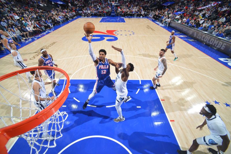 PHILADELPHIA, PA - MARCH 6:  Tobias Harris #12 of the Philadelphia 76ers drives to the basket during the game against the Memphis Grizzlies on March 6, 2024 at the Wells Fargo Center in Philadelphia, Pennsylvania NOTE TO USER: User expressly acknowledges and agrees that, by downloading and/or using this Photograph, user is consenting to the terms and conditions of the Getty Images License Agreement. Mandatory Copyright Notice: Copyright 2024 NBAE (Photo by Jesse D. Garrabrant/NBAE via Getty Images)