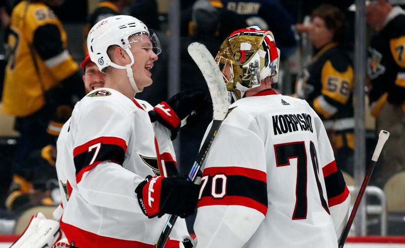 Oct 28, 2023; Pittsburgh, Pennsylvania, USA; Ottawa Senators left wing Brady Tkachuk (7) and goaltender Joonas Korpisalo (70) celebrates after defeating the Pittsburgh Penguins at PPG Paints Arena. Ottawa won 5-2. Mandatory Credit: Charles LeClaire-USA TODAY Sports