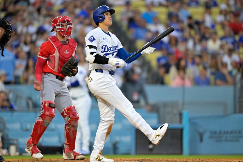 Jun 21, 2024; Los Angeles, California, USA;  Los Angeles Dodgers designated hitter Shohei Ohtani (17) at bat in the third inning against the Los Angeles Angels at Dodger Stadium. Mandatory Credit: Jayne Kamin-Oncea-USA TODAY Sports