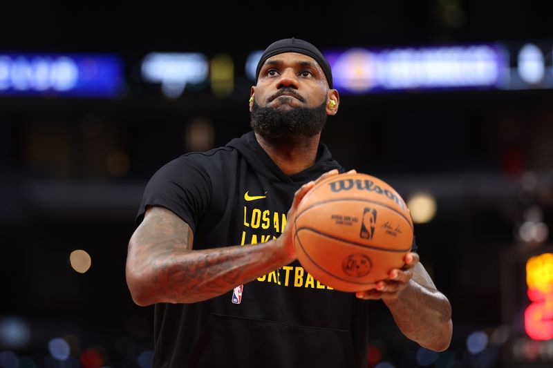 CHICAGO, ILLINOIS - DECEMBER 20: LeBron James #23 of the Los Angeles Lakers warms up prior to the game against the Chicago Bulls at the United Center on December 20, 2023 in Chicago, Illinois. NOTE TO USER: User expressly acknowledges and agrees that, by downloading and or using this photograph, User is consenting to the terms and conditions of the Getty Images License Agreement.  (Photo by Michael Reaves/Getty Images)