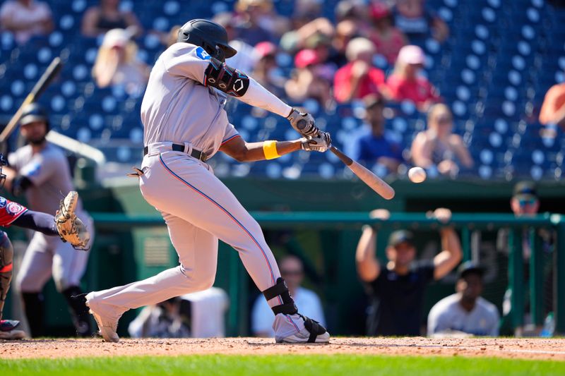 Sep 3, 2023; Washington, District of Columbia, USA;  Miami Marlins right fielder Jesus Sanchez (7) hits a single against the Washington Nationals during the sixth inning at Nationals Park. Mandatory Credit: Gregory Fisher-USA TODAY Sports