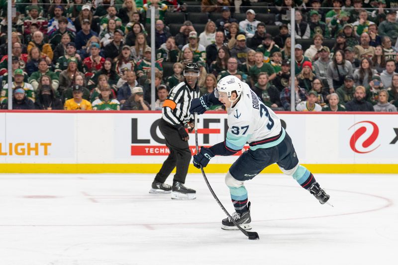 Apr 18, 2024; Saint Paul, Minnesota, USA; Seattle Kraken center Yanni Gourde (37) scores a goal against the Minnesota Wild in the third period at Xcel Energy Center. Mandatory Credit: Matt Blewett-USA TODAY Sports