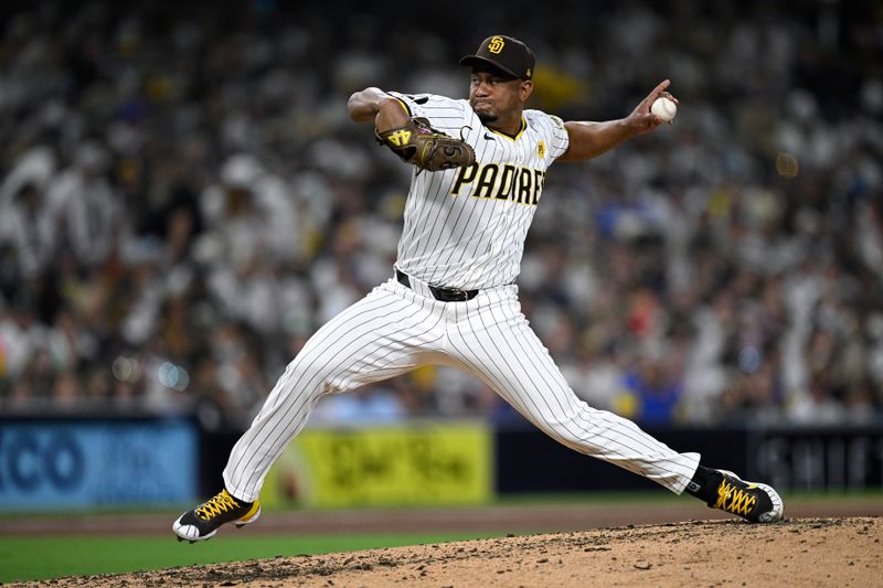 Jun 20, 2024; San Diego, California, USA; San Diego Padres relief pitcher Wandy Peralta (58) pitches against the Milwaukee Brewers during the seventh inning at Petco Park. Mandatory Credit: Orlando Ramirez-USA TODAY Sports