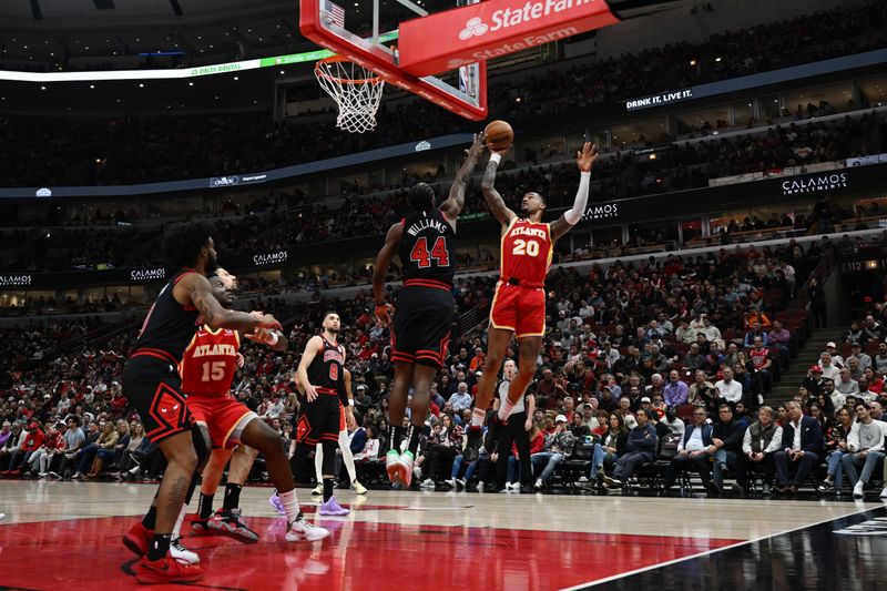 CHICAGO, ILLINOIS - APRIL 04: Bruno Fernando #20 of the Atlanta Hawks shoots in the first half against the Chicago Bulls at United Center on April 04, 2023 in Chicago, Illinois. NOTE TO USER: User expressly acknowledges and agrees that, by downloading and or using this photograph, User is consenting to the terms and conditions of the Getty Images License Agreement.  (Photo by Quinn Harris/Getty Images)