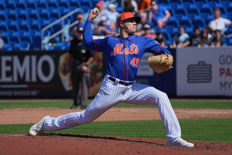 Feb 27, 2024; Port St. Lucie, Florida, USA;  New York Mets pitcher Yacksel Rios (49) pitches in the fifth inning against the Miami Marlins at Clover Park. Mandatory Credit: Jim Rassol-USA TODAY Sports