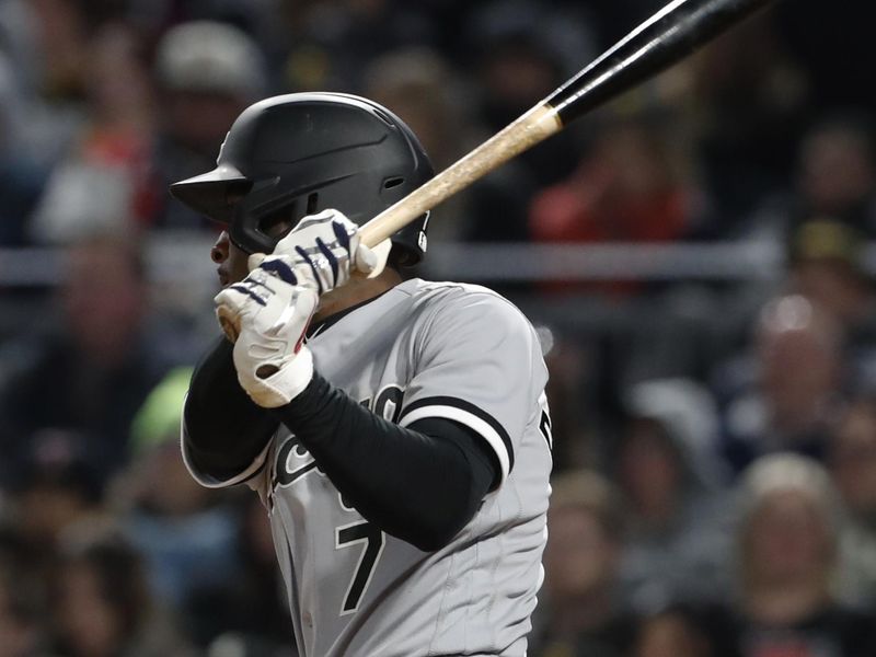 Apr 8, 2023; Pittsburgh, Pennsylvania, USA; Chicago White Sox shortstop Tim Anderson (7) hits an RBI single against the Pittsburgh Pirates during the seventh inning at PNC Park. Mandatory Credit: Charles LeClaire-USA TODAY Sports