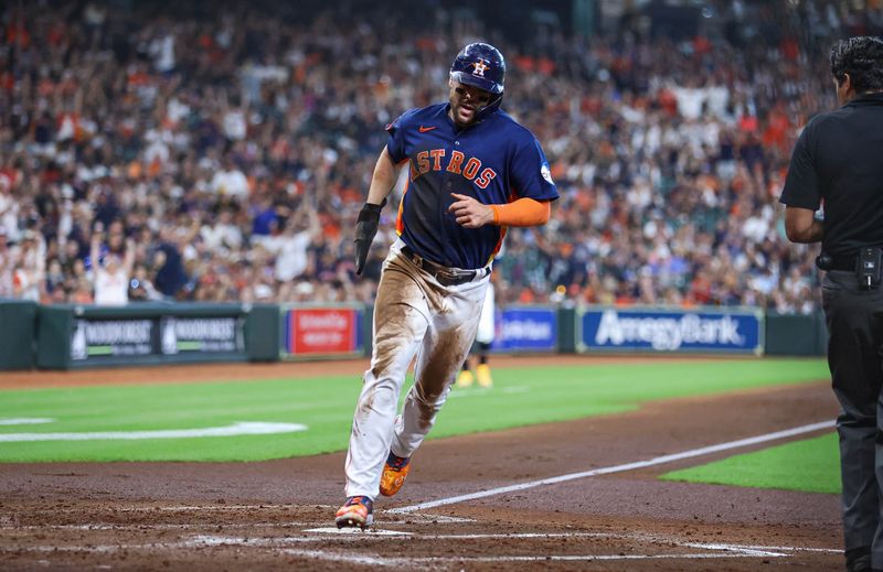 Sep 10, 2023; Houston, Texas, USA; Houston Astros center fielder Chas McCormick (20) scores a run during the third inning against the San Diego Padres at Minute Maid Park. Mandatory Credit: Troy Taormina-USA TODAY Sports