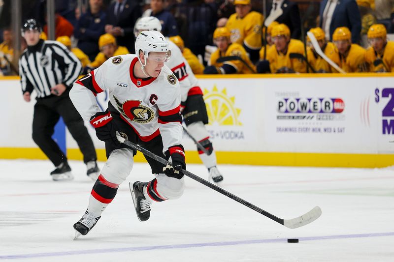 Jan 22, 2026; Nashville, Tennessee, USA;  Ottawa Senators left wing Brady Tkachuk (7) skates with the puck against the Nashville Predators during the first period at Bridgestone Arena. Mandatory Credit: Steve Roberts-Imagn Images