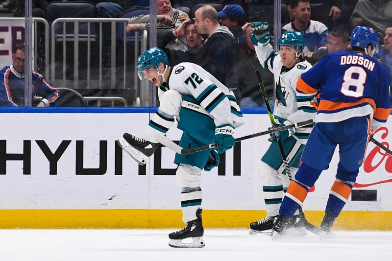 Dec 5, 2023; Elmont, New York, USA; San Jose Sharks left wing William Eklund (72) celebrates his game winning overtime goal against the New York Islanders with 4.3 seconds to go during the overtime period at UBS Arena. Mandatory Credit: Dennis Schneidler-USA TODAY Sports