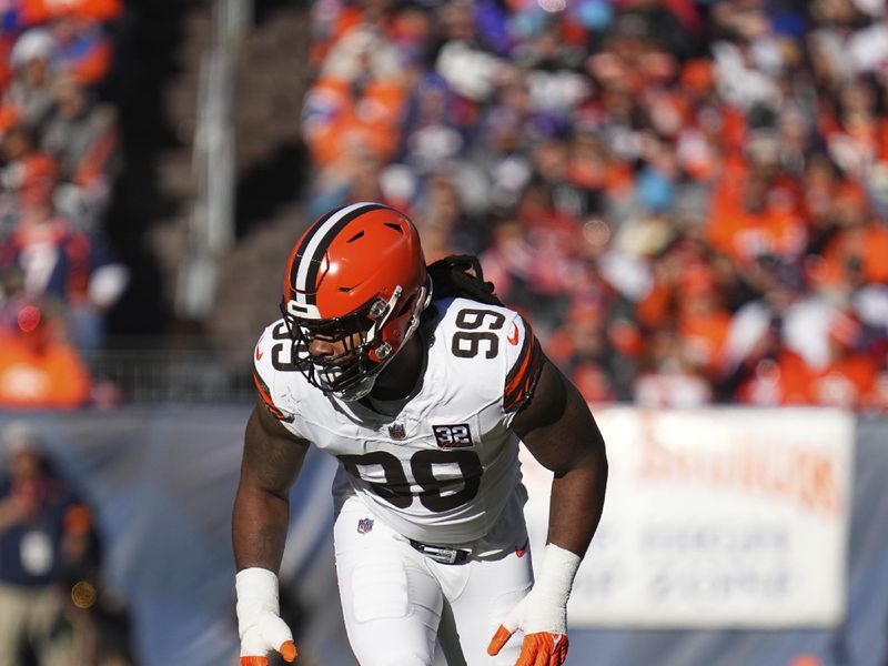 Cleveland Browns defensive end Za'Darius Smith (99) against the Denver Broncos of an NFL football game Sunday November 26, 2023, in Denver. (AP Photo/Bart Young)