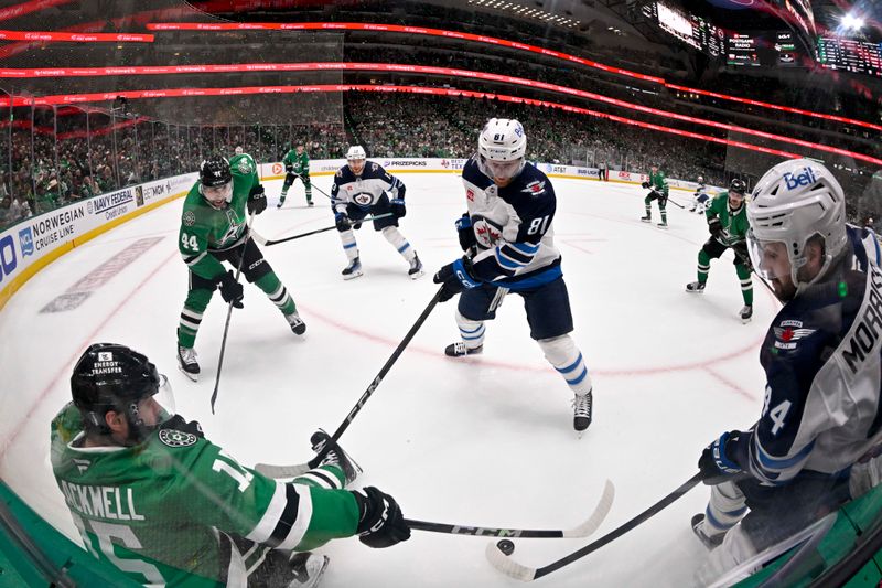 May 11, 2025; Dallas, Texas, USA; Dallas Stars center Colin Blackwell (15) and defenseman Cody Ceci (44) and Winnipeg Jets defenseman Josh Morrissey (44) and left wing Kyle Connor (81) battle for puck during the third period in game three of the second round of the 2025 Stanley Cup Playoffs at American Airlines Center. Mandatory Credit: Jerome Miron-Imagn Images