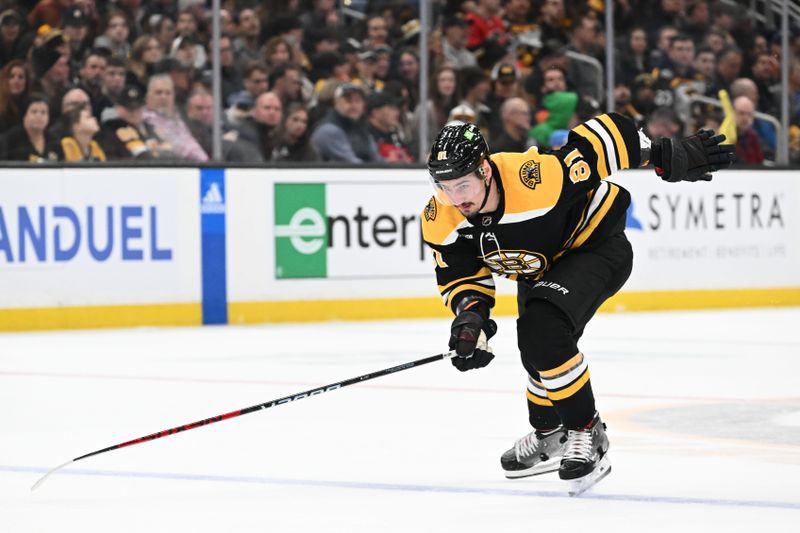 Mar 9, 2023; Boston, Massachusetts, USA; Boston Bruins defenseman Dmitry Orlov (81) skates for the puck during the second of a game against the Edmonton Oilers period at the TD Garden. Mandatory Credit: Brian Fluharty-USA TODAY Sports