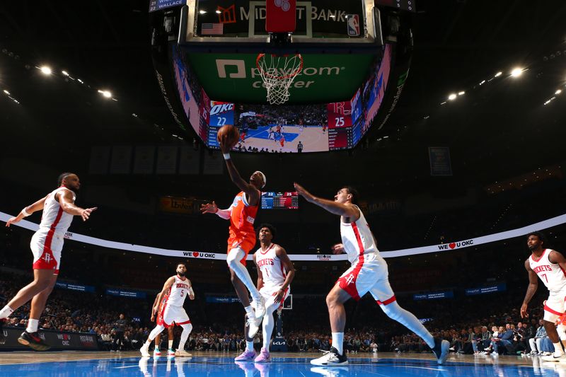 OKLAHOMA CITY, OK - NOVEMBER 8: Shai Gilgeous-Alexander #2 of the Oklahoma City Thunder drives to the basket during the game against the Houston Rockets on November 8, 2024 at Paycom Center in Oklahoma City, Oklahoma. NOTE TO USER: User expressly acknowledges and agrees that, by downloading and or using this photograph, User is consenting to the terms and conditions of the Getty Images License Agreement. Mandatory Copyright Notice: Copyright 2024 NBAE (Photo by Zach Beeker/NBAE via Getty Images)