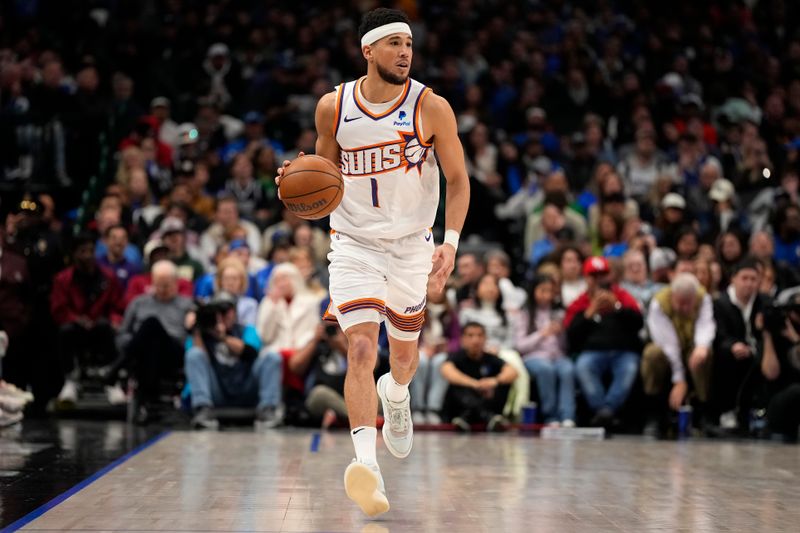 DALLAS, TEXAS - JANUARY 24: Devin Booker #1 of the Phoenix Suns brings the ball up court during the first half against the Dallas Mavericks at American Airlines Center on January 24, 2024 in Dallas, Texas. NOTE TO USER: User expressly acknowledges and agrees that, by downloading and or using this photograph, User is consenting to the terms and conditions of the Getty Images License Agreement. (Photo by Sam Hodde/Getty Images)