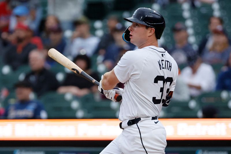 Jul 10, 2024; Detroit, Michigan, USA;  Detroit Tigers second baseman Colt Keith (33) hits a RBI triple in the first inning against the Cleveland Guardians at Comerica Park. Mandatory Credit: Rick Osentoski-USA TODAY Sports