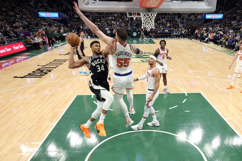 MILWAUKEE, WI - APRIL 7: Giannis Antetokounmpo #34 of the Milwaukee Bucks drives to the basket during the game against the New York Knicks on April 7, 2024 at the Fiserv Forum Center in Milwaukee, Wisconsin. NOTE TO USER: User expressly acknowledges and agrees that, by downloading and or using this Photograph, user is consenting to the terms and conditions of the Getty Images License Agreement. Mandatory Copyright Notice: Copyright 2024 NBAE (Photo by Jeff Haynes/NBAE via Getty Images).