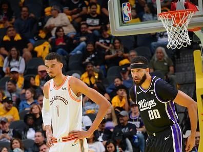 SAN ANTONIO, TX - NOVEMBER 17: Victor Wembanyama #1 of the San Antonio Spurs and JaVale McGee #00 of the Sacramento Kings look on during the game during the In-Season Tournament on November 17, 2023 at the Frost Bank Center in San Antonio, Texas. NOTE TO USER: User expressly acknowledges and agrees that, by downloading and or using this photograph, user is consenting to the terms and conditions of the Getty Images License Agreement. Mandatory Copyright Notice: Copyright 2023 NBAE (Photos by Michael Gonzales/NBAE via Getty Images)